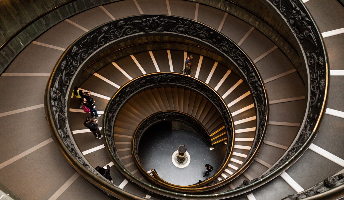 Vatican Highlights Tour 10 ROME, ITALY - JUNE 28, 2019: overhead view of people on Bramante Staircase in vatican museums